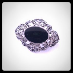Bejeweled black brooch. Sultana style.